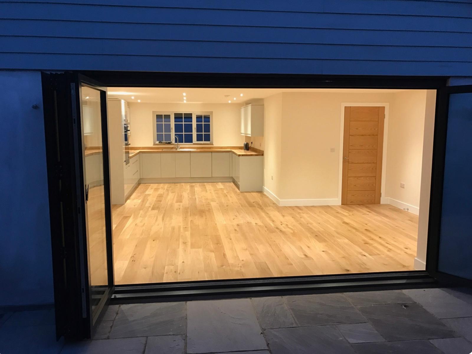 Finished home extension and open-plan kitchen by LJB Lee Botting