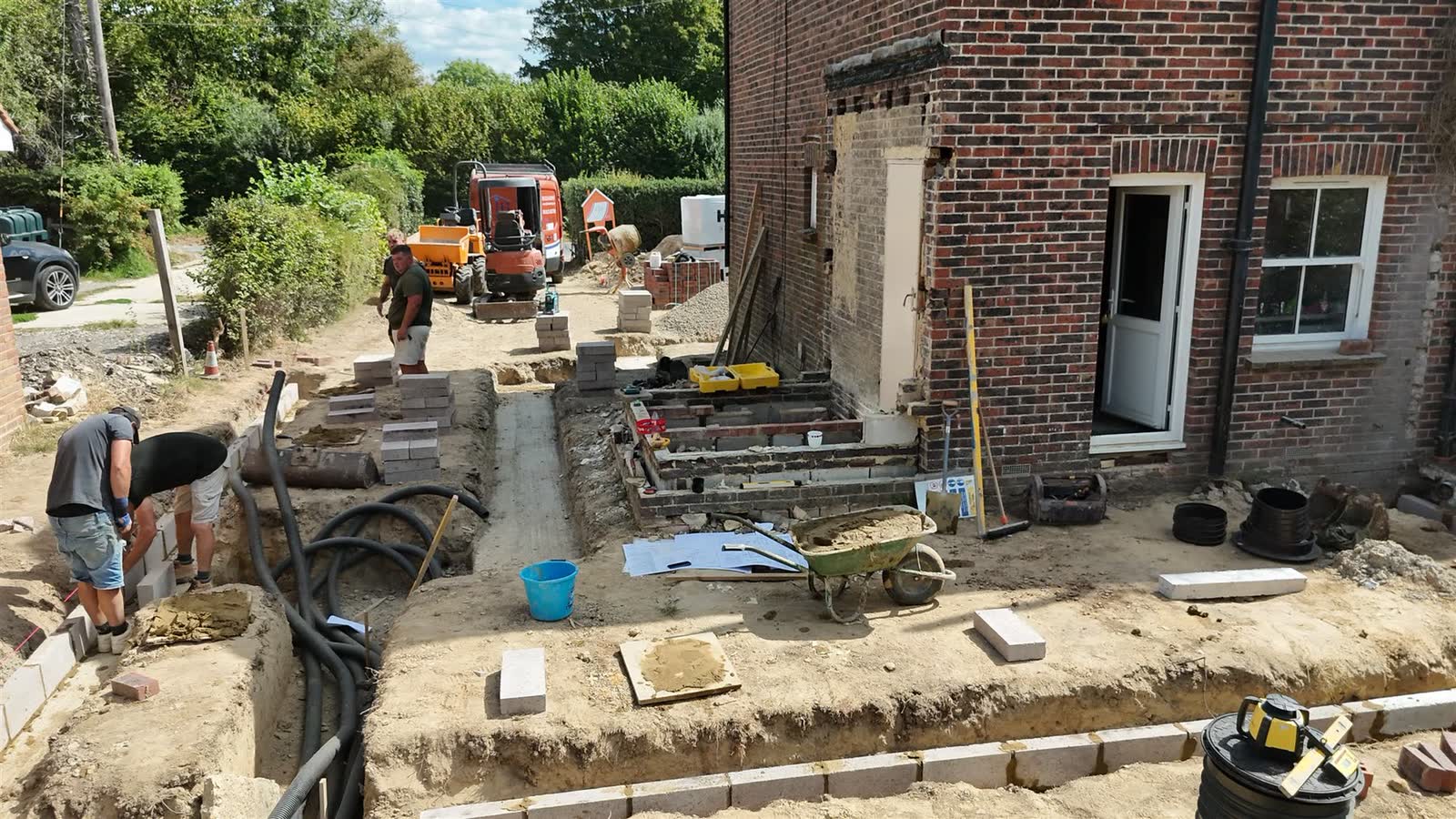 Aerial progress photograph of extension groundworks