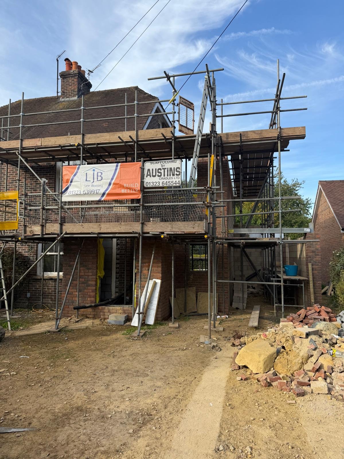 Rear extension construction with scaffolding and masonry work