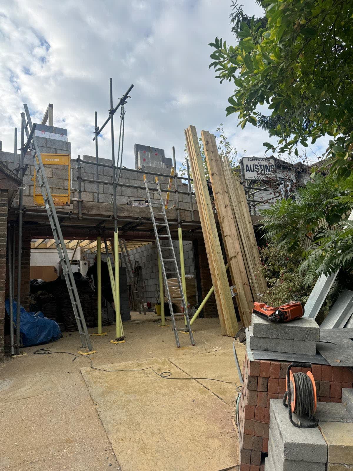 Timber roof structure taking shape on a rear extension