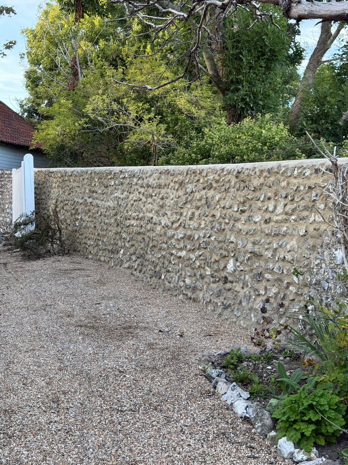 Traditional flint wall after careful restoration
