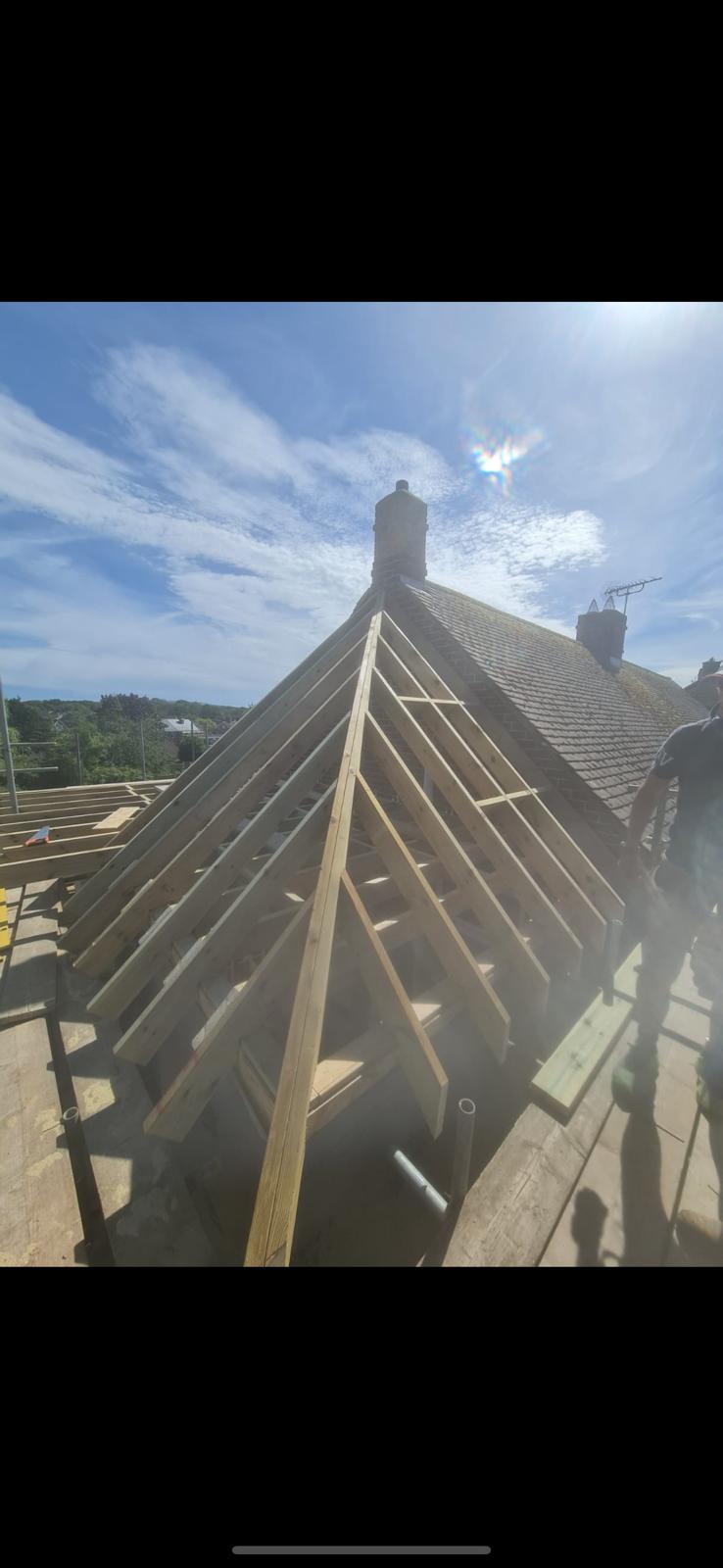 Pitched roof timber frame during construction