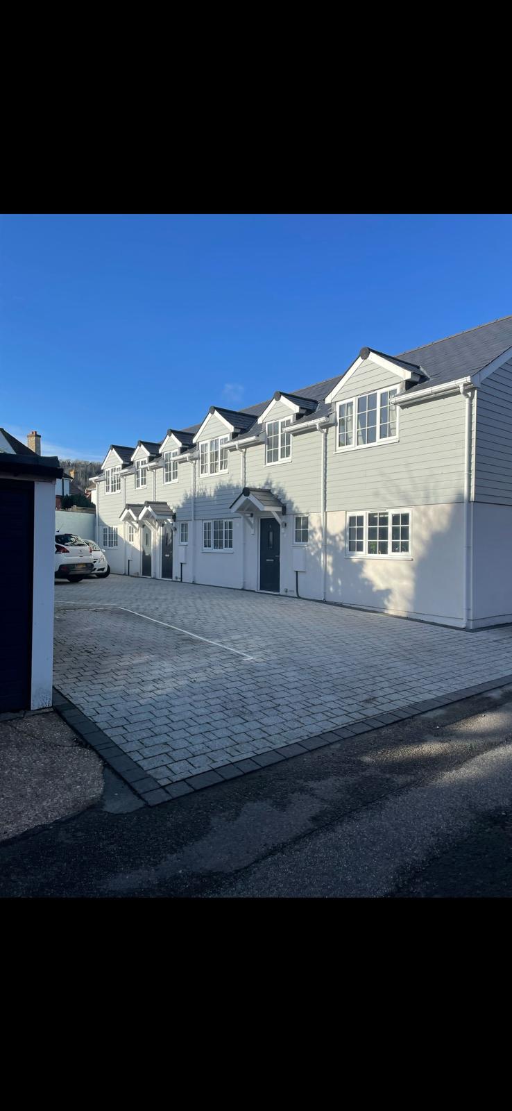 Refurbished homes with a shared paved frontage
